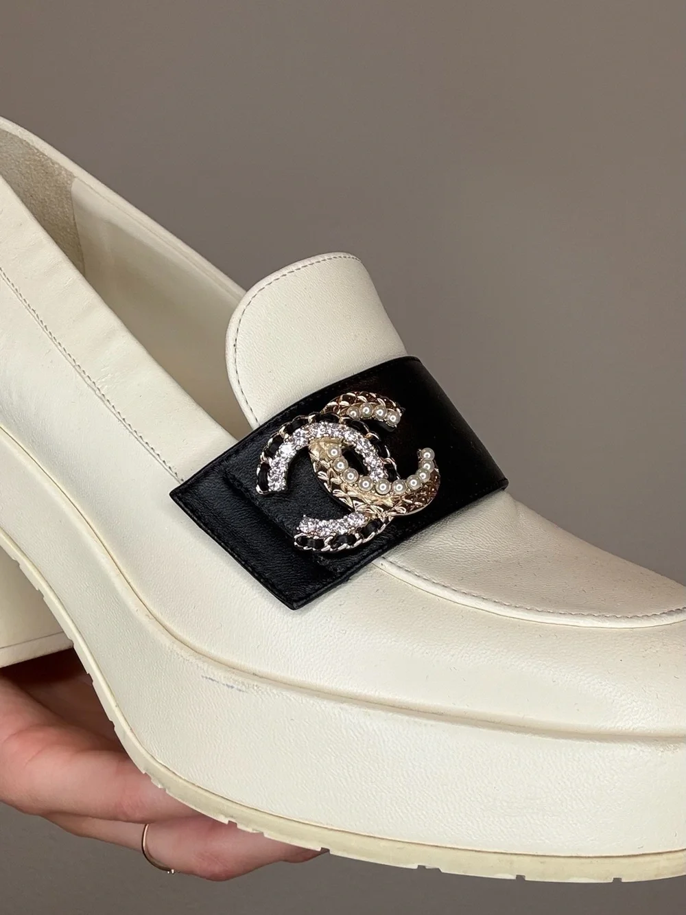 CHANEL White Leather Loafers with Black Band and Crystal CC Emblem